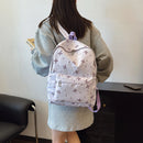Mochila de Volta às Aulas com Estampa Divertida de Laço, Conforto Matelassê e Sistema de Organização com Múltiplos Bolsos para a Vida Universitária das Mulheres