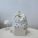 Mochila de Volta às Aulas com Estampa Divertida de Laço, Conforto Matelassê e Sistema de Organização com Múltiplos Bolsos para a Vida Universitária das Mulheres