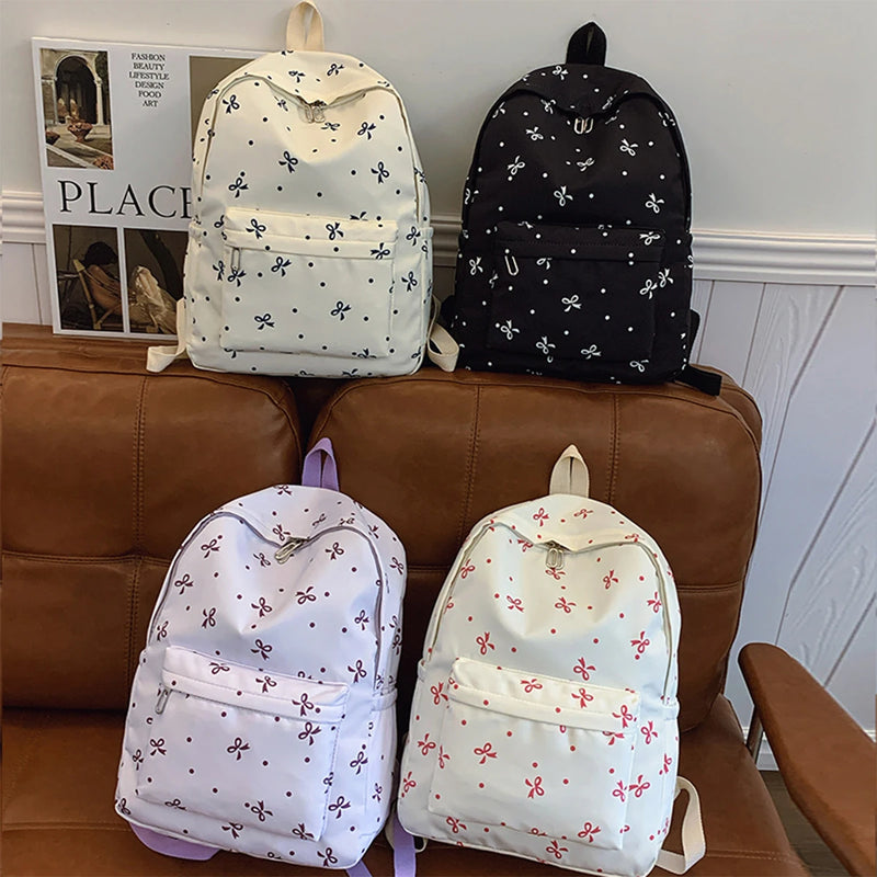 Mochila de Volta às Aulas com Estampa Divertida de Laço, Conforto Matelassê e Sistema de Organização com Múltiplos Bolsos para a Vida Universitária das Mulheres